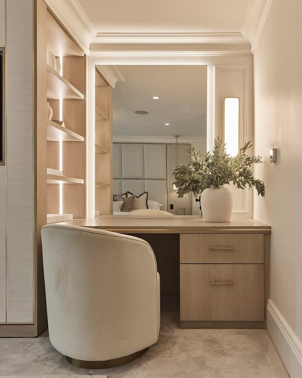 An elegant dressing area in a Prestbury family home by Cheshire Property Studio