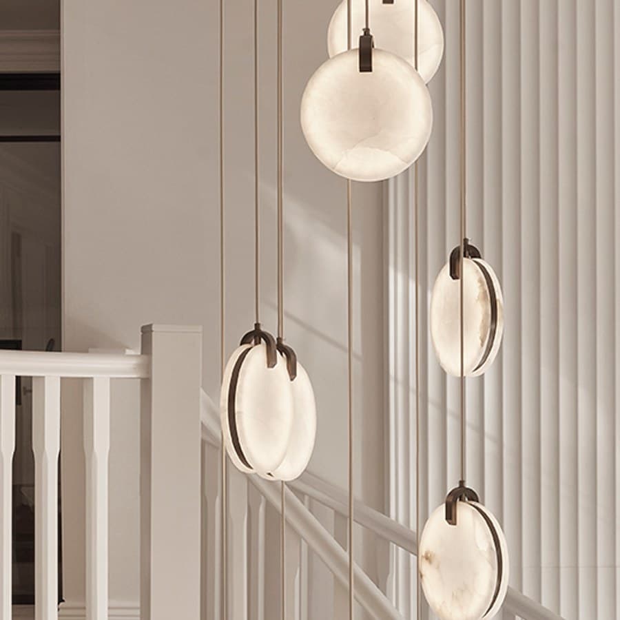 The alabaster pendant lights cascading through the Prestbury stairwell