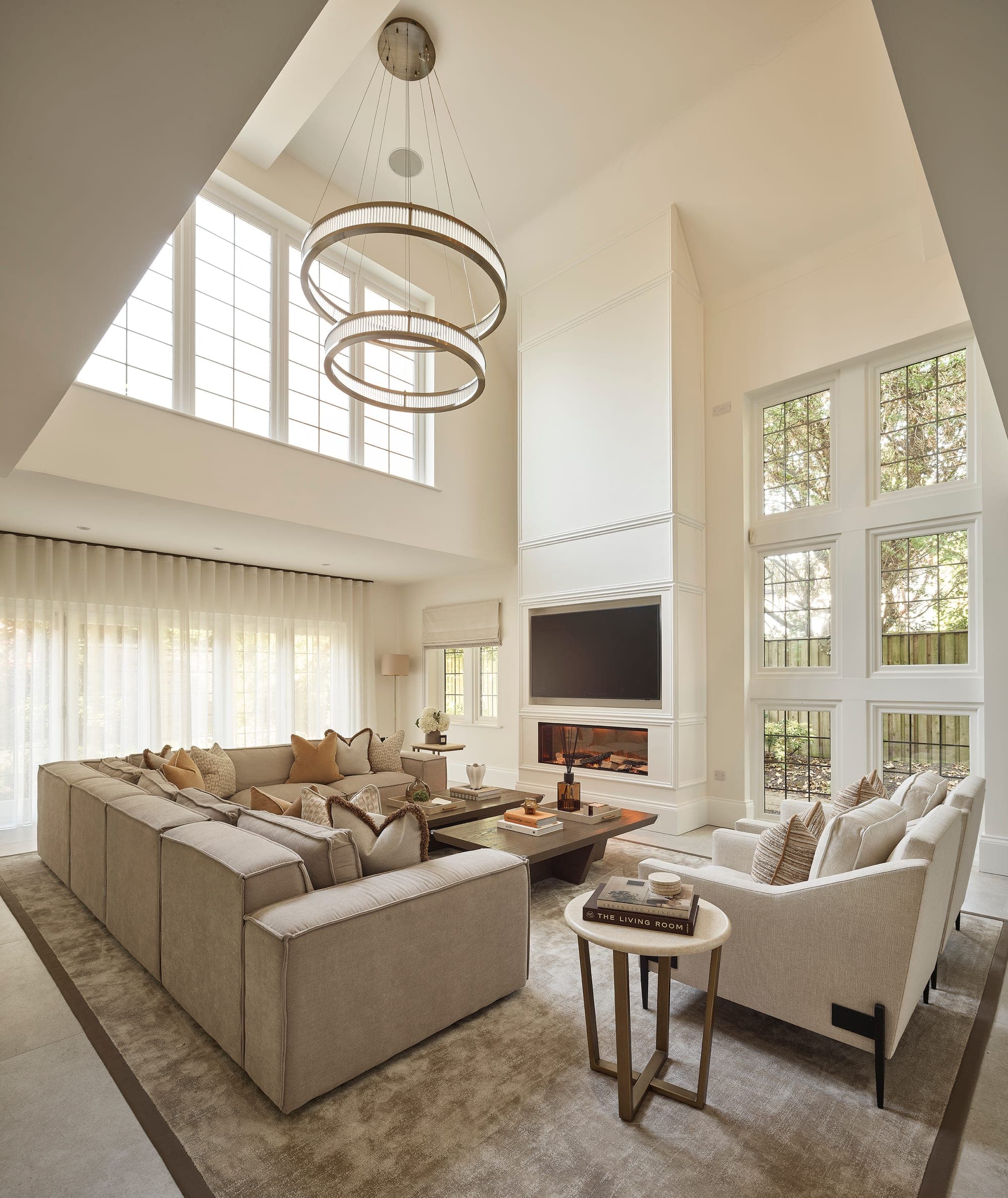 A calm, tonal sitting room by Cheshire Property Studio