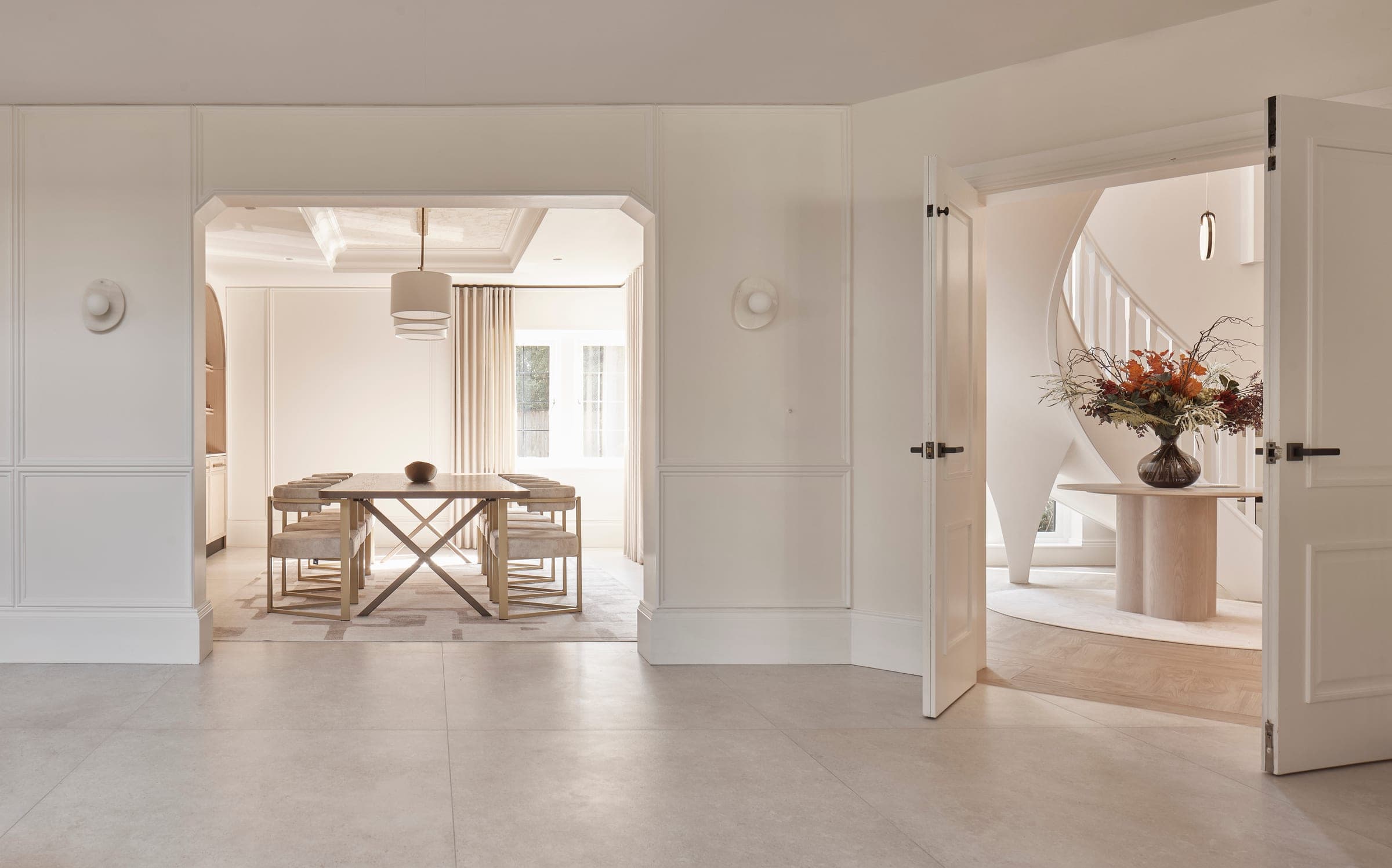 The dining room and entrance hall of a Cheshire home designed by Cheshire Property Studio