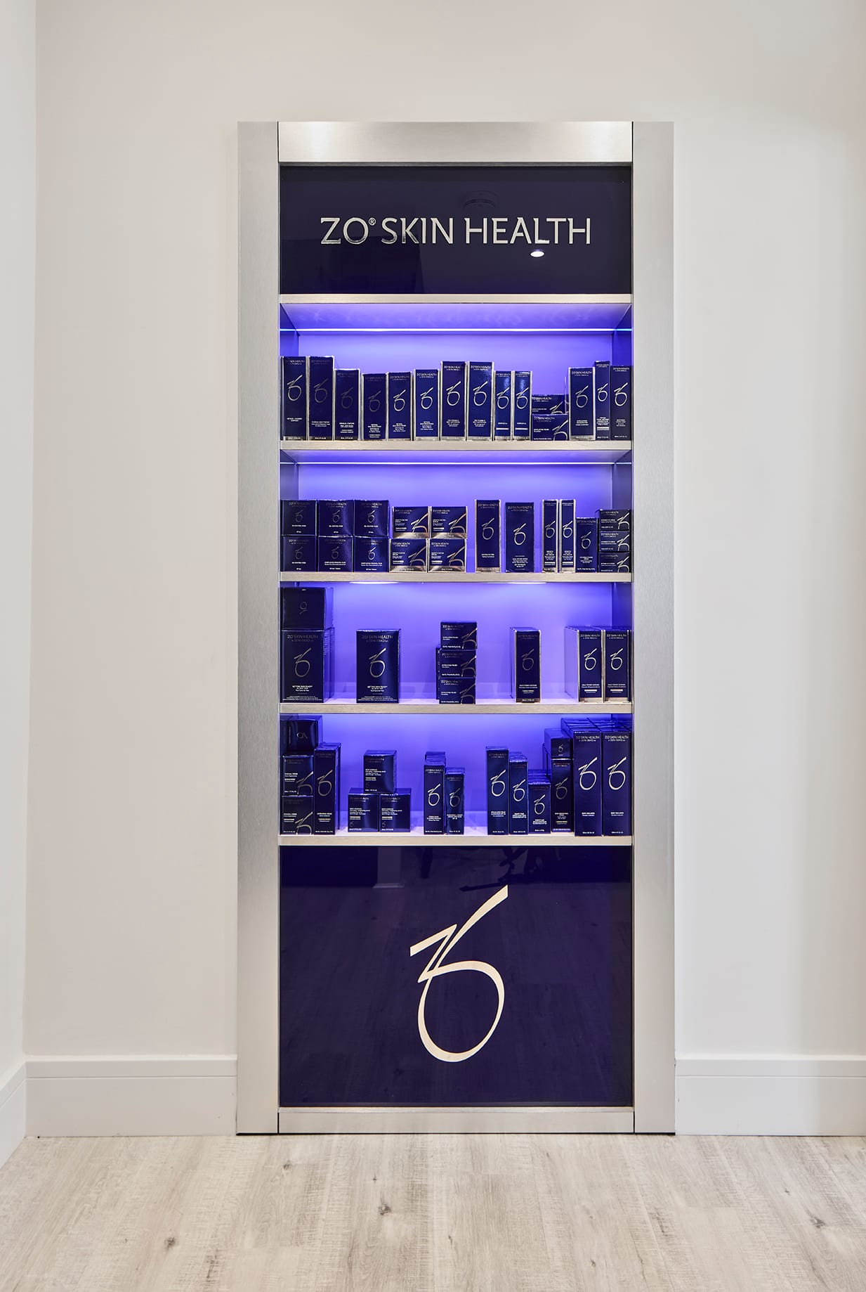 A backlit retail display niche at Bank Medi Spa, Hale
