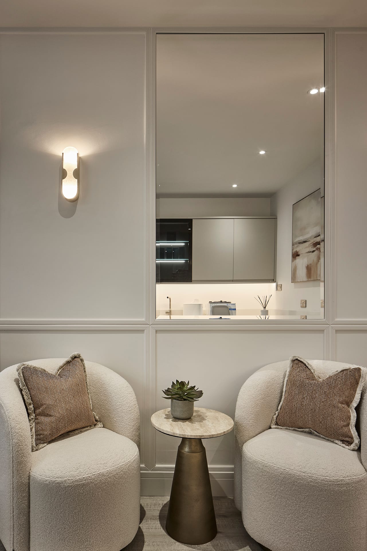 A treatment room and lounge area at Bank Medi Spa