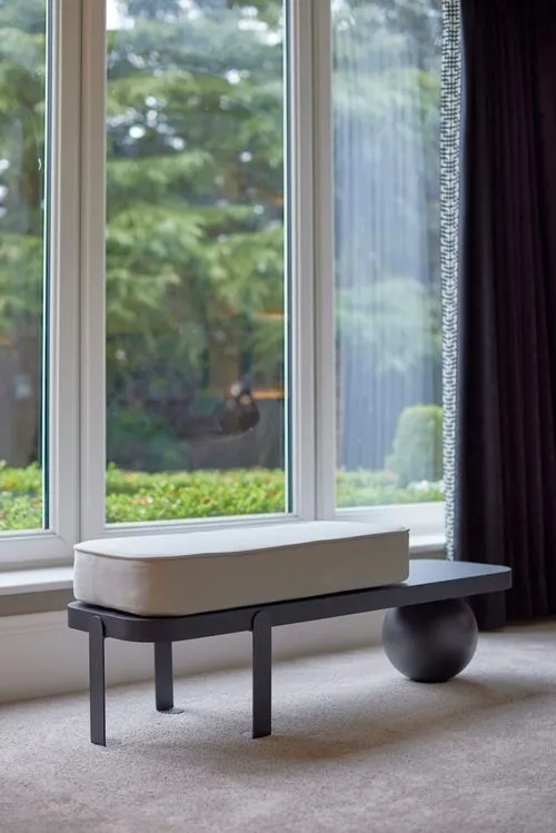 A bespoke window seat in a calm Knutsford home