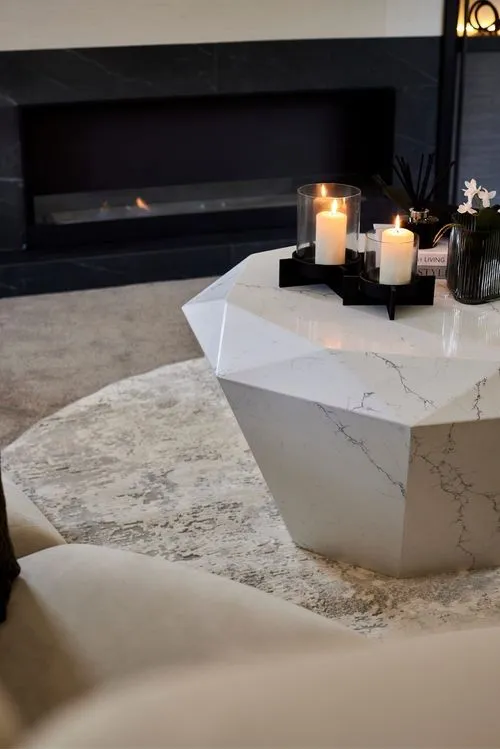 Candlelight on a sculptural marble coffee table