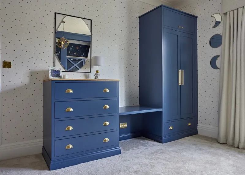 A fitted dresser, desk and wardrobe, made to measure so not an inch is wasted